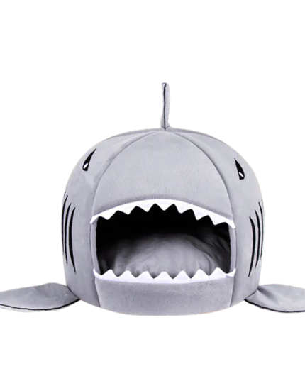 Gray shark-shaped pet bed on a white background