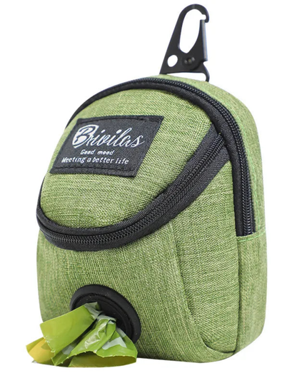 Green waste bag holder with black zipper and carabiner on a white background