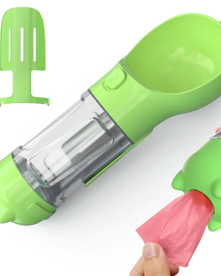 Green and clear ice cream maker with pink scoop on a white background