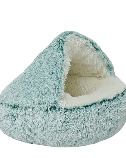 Teal and white fluffy pet bed on a white background