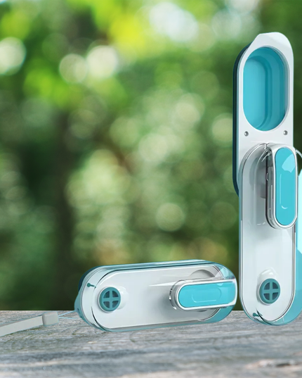 Turquoise and silver door handles on a wooden surface with a blurred green background