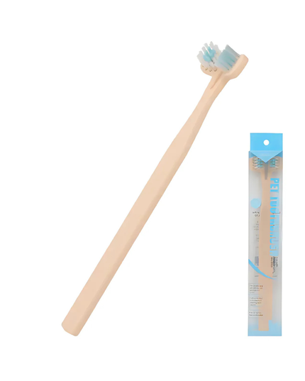 Dog toothbrush with packaging on a white background