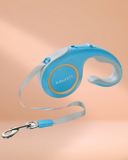 Blue retractable dog leash with Kimpet branding on a peach background