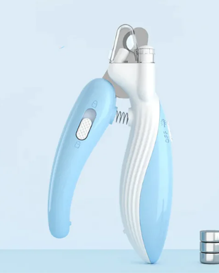Pet nail clipper with blue handle and white body on a light blue background