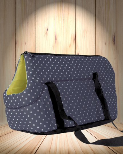 Dog carrier with polka dot pattern on a wooden floor and wall background