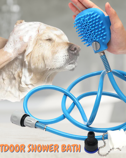 Dog being bathed with a blue outdoor shower bath system held by a person.