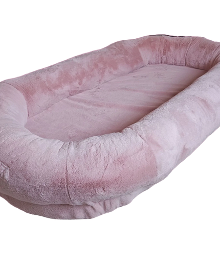 Pink pet bed on a white background
