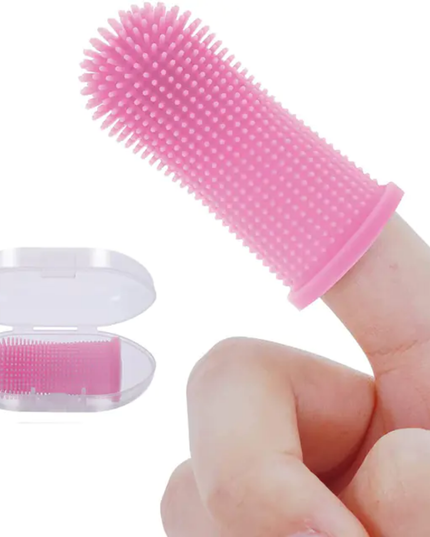 Pink silicone scrubber on a finger with inset showing brush head