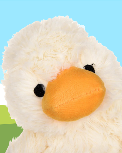 Close-up of a plush duck toy with a light blue background