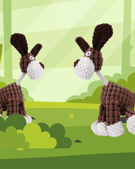 Two crochet donkeys on a green forest background