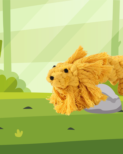 Plush lion toy on a green landscape with trees and rocks
