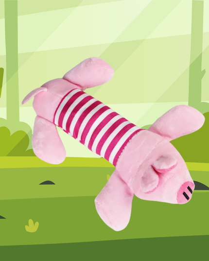Pink plush toy with striped pattern on a green forest background