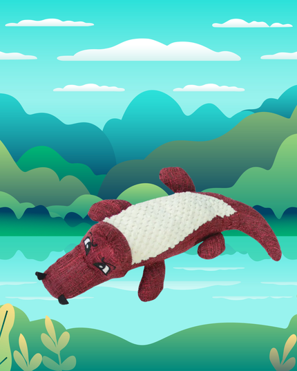 Plush toy resembling a platypus against a stylized landscape background