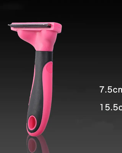 Pink and black pet grooming tool with measurements on a dark background