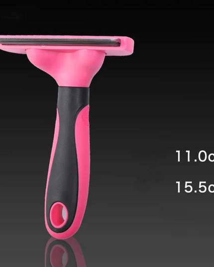 Pink and black pet grooming brush with measurements on a black background