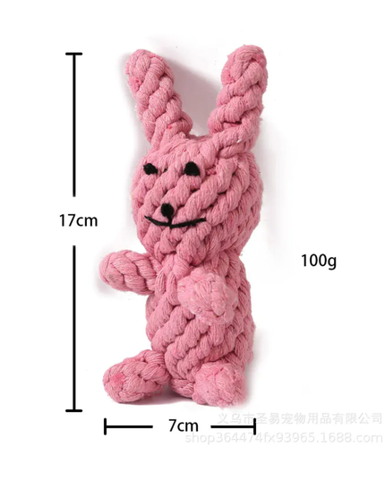 Pink knitted dog toy shaped like a bunny with measurements and weight on a white background
