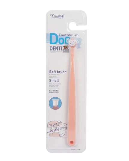 Dog toothbrush with packaging on a white background