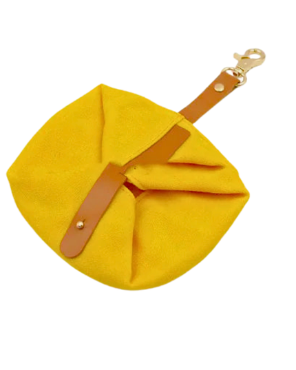 Yellow pouch with a brown strap on a white background