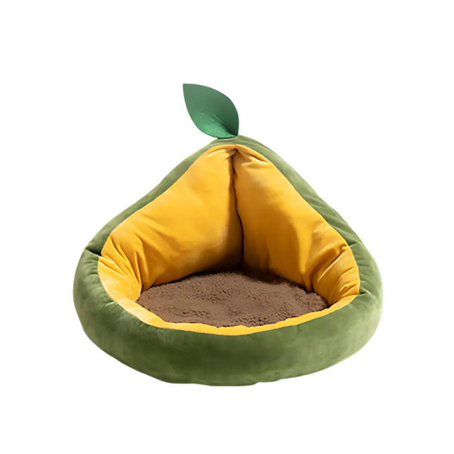 Avocado-shaped pet bed with green exterior and yellow interior on a white background