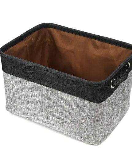 Storage basket with gray exterior, black interior, and handle on a white background