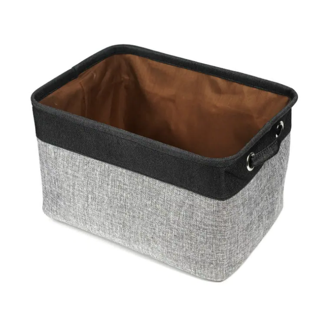 Storage basket with gray exterior, black interior, and handle on a white background