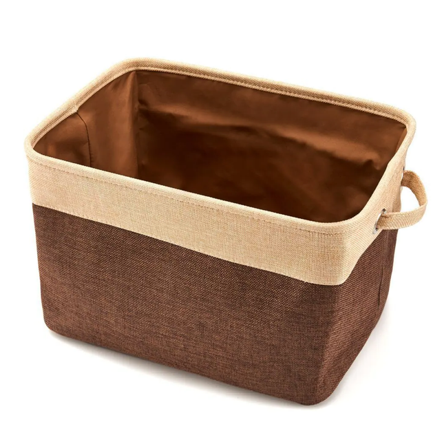 Brown storage basket with beige interior on a white background