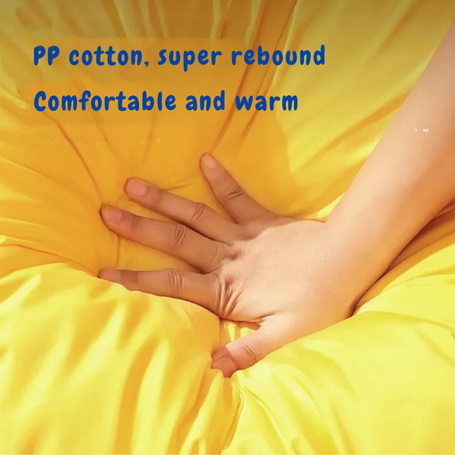 Hand on a yellow surface with text about PP cotton and comfort.