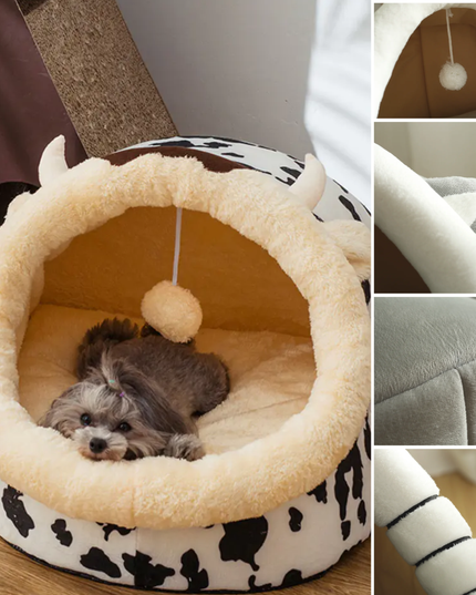 Pet bed with cow print and plush interior, featuring a small dog inside.