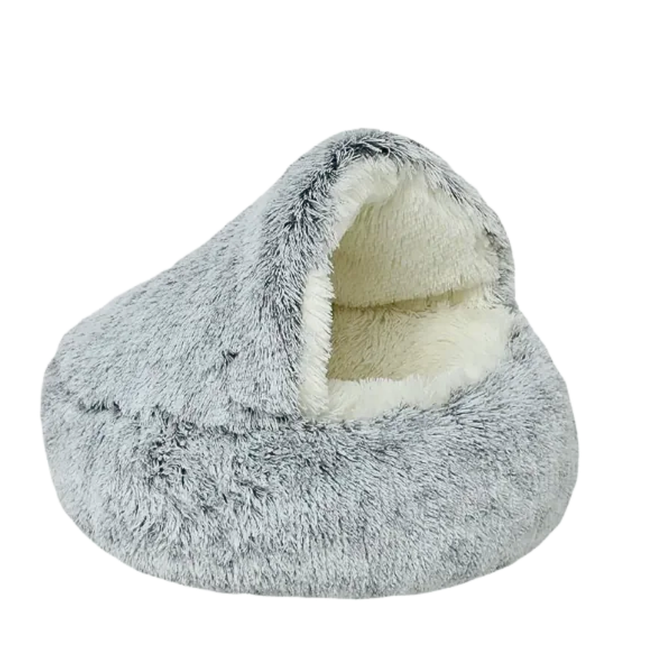 Gray fuzzy pet bed with white interior on a white background