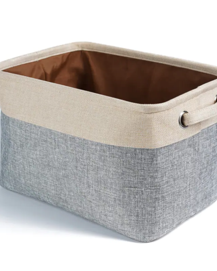 Storage basket with beige top and gray bottom on a white background