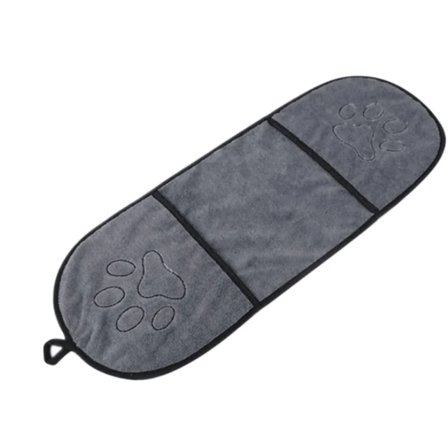 Gray pet travel mat with paw prints on a white background