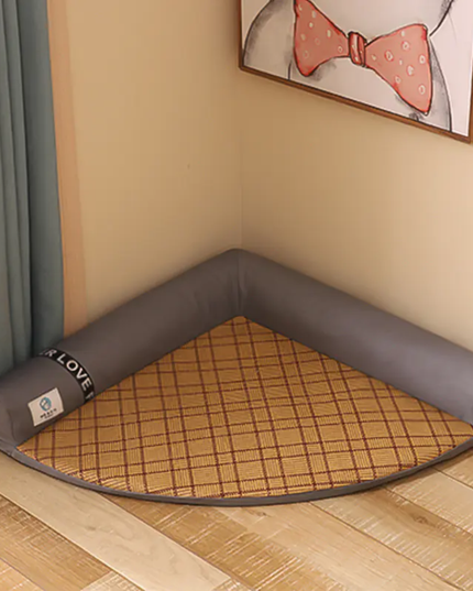 Corner pet bed with grid pattern on a wooden floor, featuring the brand 'Pet Love'.