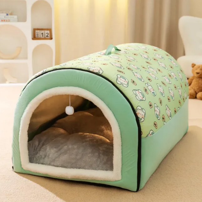 Green pet bed with a pattern on a beige surface