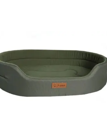 Green pet bed with a brand label on a white background