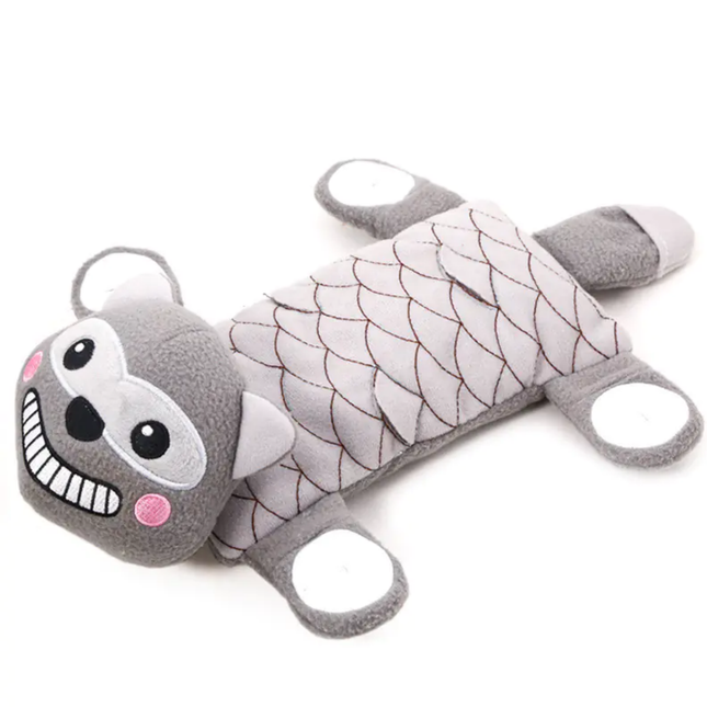 Gray and white dog toy shaped like a fish with a face on a white background
