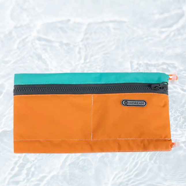 Orange pouch with teal top section on a light gray background