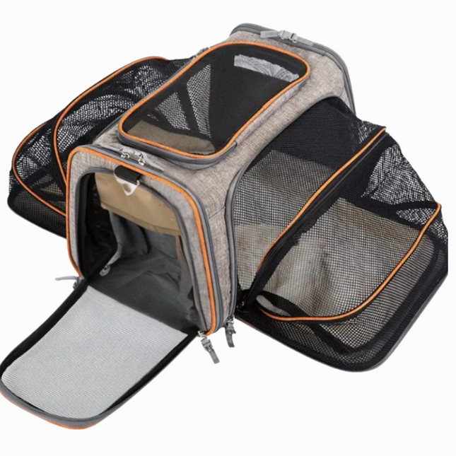 Pet carrier with mesh sides on a white background