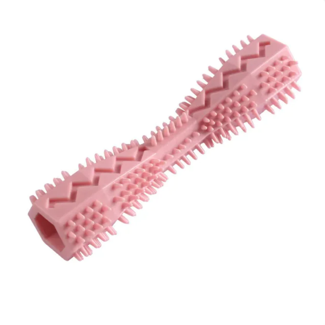 Pink textured dog toy on a white background