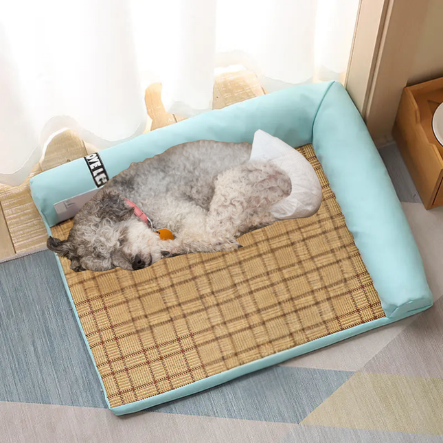 Dog lying on a cooling pad with a light blue border in a home setting.