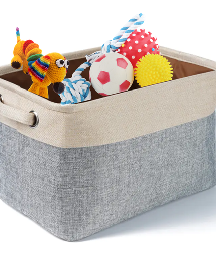 Storage bin with colorful toys on a white background