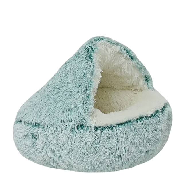 Teal and white fluffy pet bed on a white background
