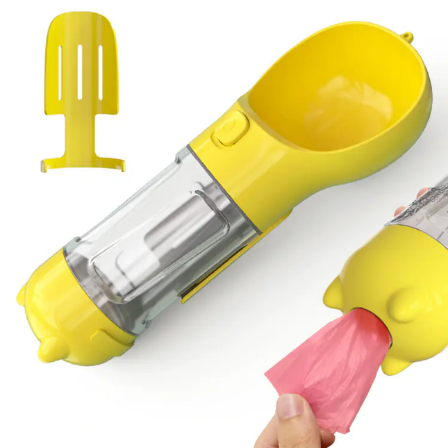 Yellow ice cream maker with clear middle section and pink scoop on a white background