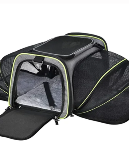 Black pet carrier with open door on a white background