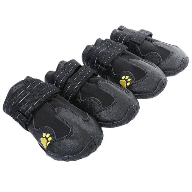 Set of black pet boots with yellow paw prints on a white background