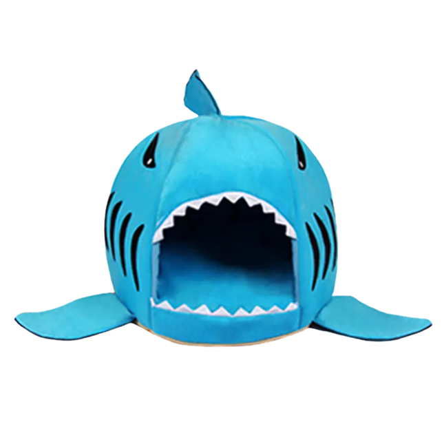 Blue shark-shaped pet bed on a white background