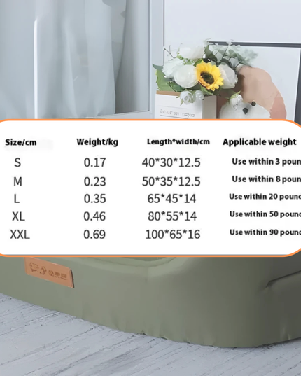 Pet bed with size chart indicating dimensions and weight capacity on a light wooden floor.