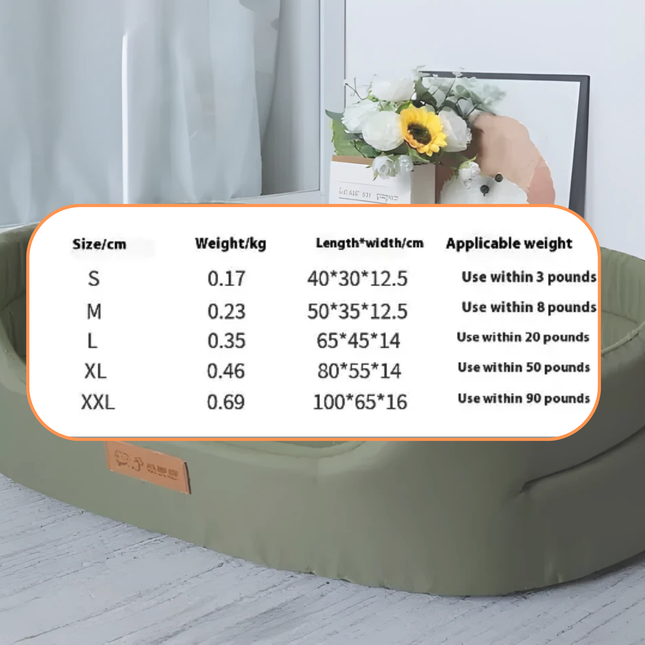 Pet bed with size chart indicating dimensions and weight capacity on a light wooden floor.