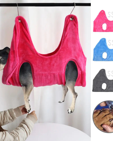 Dog wearing a pink vest hanging from a hook, with additional vests in different colors displayed.