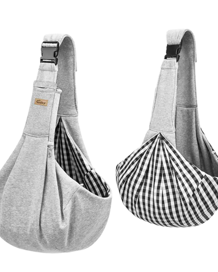 Two gray pet sling bags with checkered interior on a white background