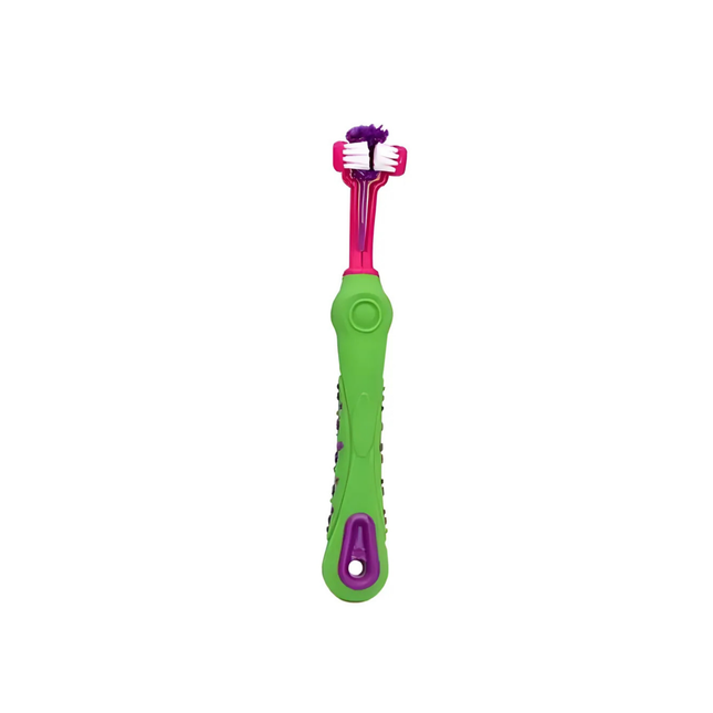 Green and pink children's toothbrush with a white background